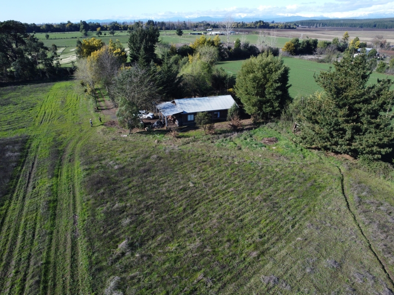 Parcela y casa parral